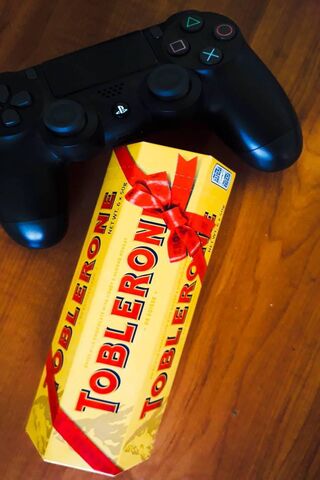 Sweet Gaming Treats: PS4 and Toblerone Delight! 🍫🎮