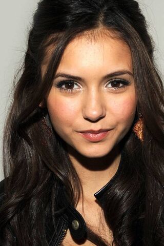 Captivating Charm: The Essence of Nina Dobrev