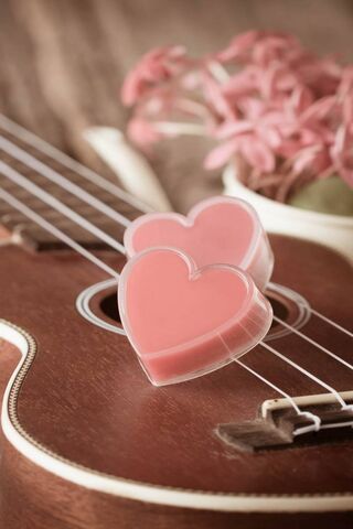Melody of Love: Pink Hearts on Strings 🎶💖
