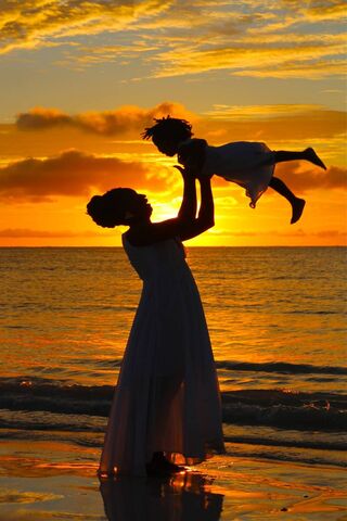 Sunset Embrace: A Mothe..