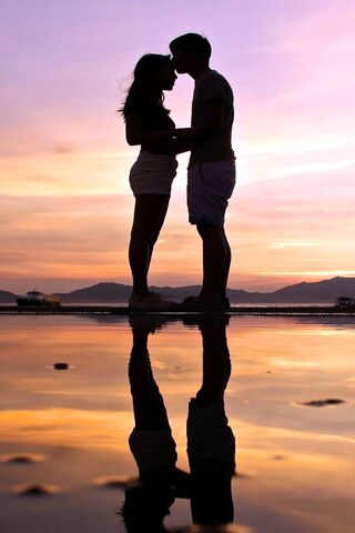 Sunset Embrace: A Moment of Love 🌅❤️