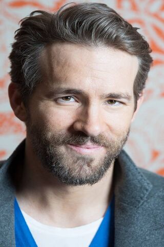Charming Smiles: The Charisma of Ryan Reynolds