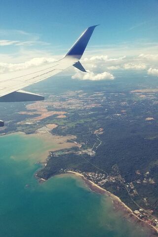 Skyward Serenity: A Glimpse from Above ✈️🌍