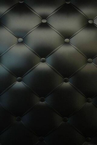 Elegant Noir: The Dark Sofa Pattern