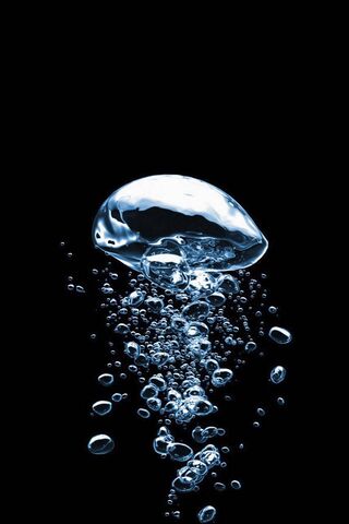 Bubbles in the Dark: A Dance of Light and Water 💧✨