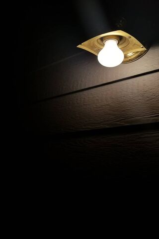 Solitary Glow in the Da..