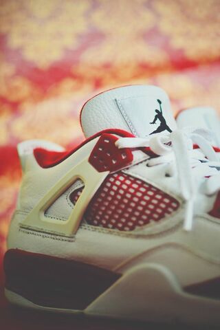 Step Up Your Game with the Air Jordan 4! 🏀👟