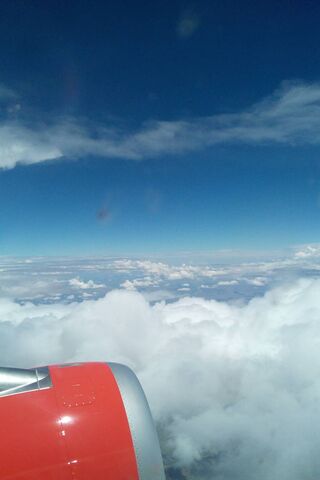 Soaring Above the Clouds 🌤️✈️