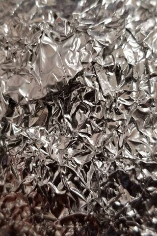 Shimmering Chaos: The Art of Crumpled Foil