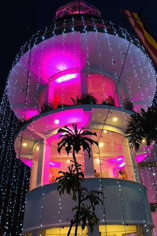 Illuminated Serenity: The Glass Pagoda at Night 🌟🏯