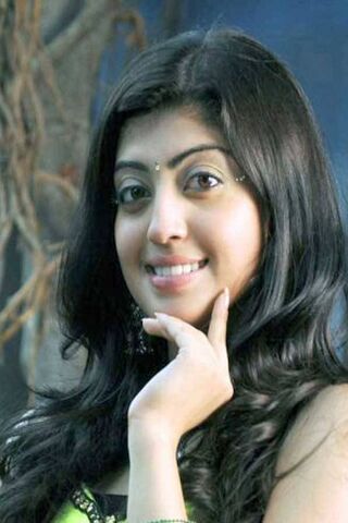 Charming Smile: Pranitha's Delightful Expression 😊✨
