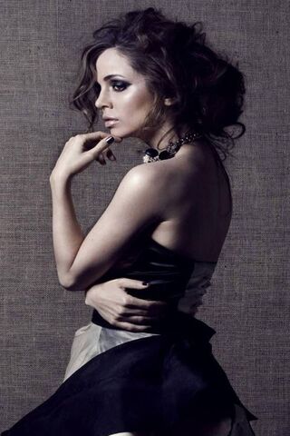 Elegance in Shadows: A Portrait of Eliza Dushku