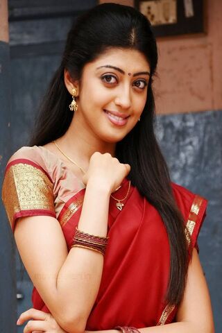 Elegance in Red: Pranitha's Saree Charm
