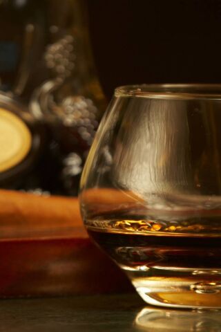 Savor the Spirit: A Glass of Elegance 🥃✨