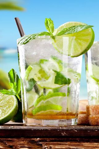 Refreshing Mojito Bliss by the Shore 🌴🍹