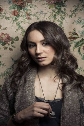 Elegance in Bloom: A Portrait of Troian Bellisario