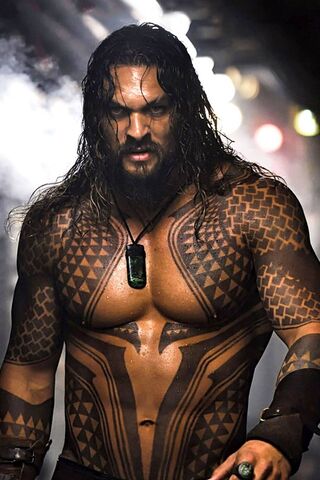 Warrior of the Waves: Jason Momoa in Action 🌊⚔️