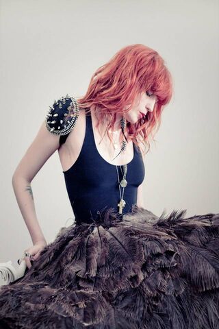 Ethereal Elegance: Florence Welch in Feathers