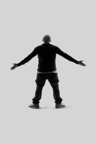 The Iconic Embrace of Eminem 🎤✨