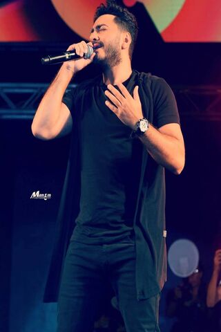Melodies of Emotion: Tamer Hussny in Concert 🎤✨