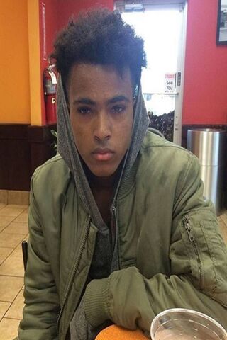 The Soulful Gaze of X*xtentacion 🎤✨