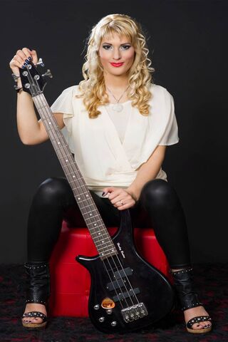 Rocking the Stage: A Blonde Bassist's Vibe 🎸✨