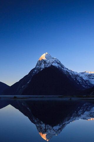 Majestic Peaks: A Reflection of Serenity 🌄✨