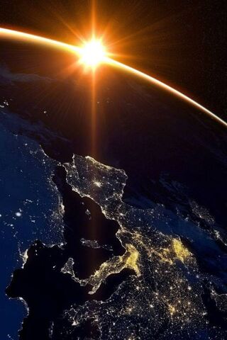 Celestial Dawn: A Glimpse of Earth from Space 🌍✨