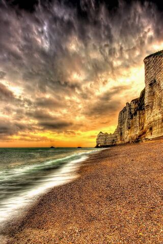 Serenity at Sunset: A Coastal Escape 🌅