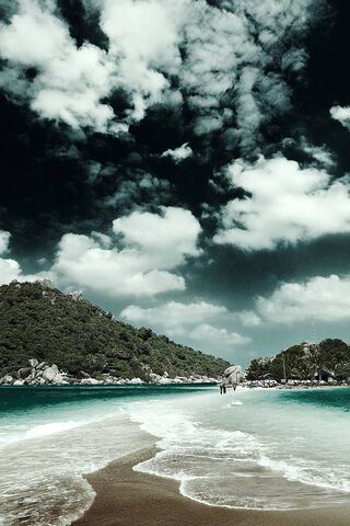Mystical Shores: A Dance of Waves and Clouds 🌊☁️