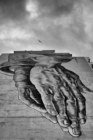 Hands of Connection: A Graffiti Masterpiece