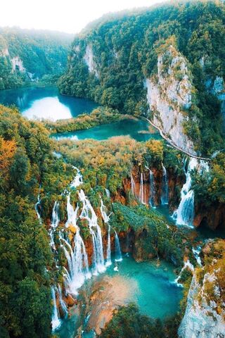 Enchanting Waters of Plitvice Lakes 🌊🍃