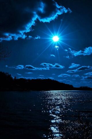 Moonlit Serenity: A Night by the Water 🌙✨
