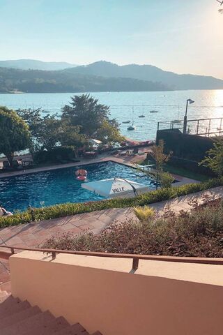 Serene Waters: A Poolside Paradise 🌊🏖️