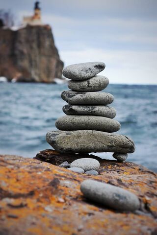 Nature's Balance: The Art of Stacked Stones 🌊🪨