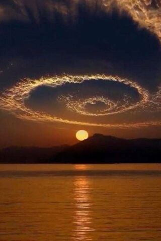 Whirlwind of Light: A Dance of Clouds and Sun