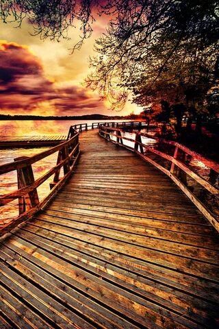 Sunset Serenity on the Colorful Bridge 🌅🌈