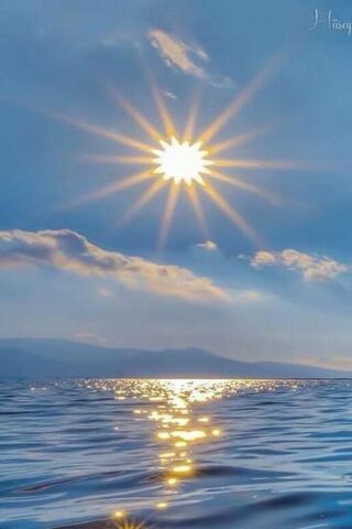Radiant Reflections: A Dance of Light on Water ☀️🌊