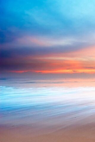 Serene Horizons: A Distant Sunset