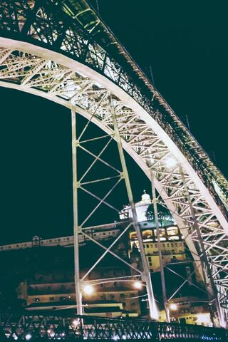Illuminated Arches: A Night by the Bridge