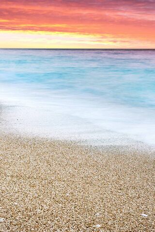 Serenity at Milos Beach: A Sunset to Remember 🌅