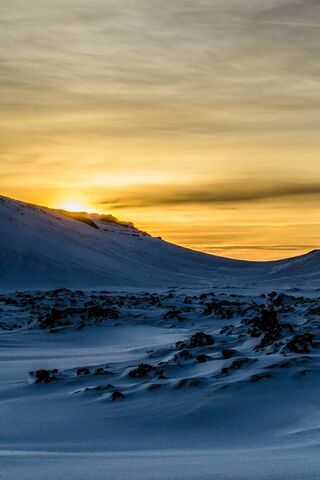 Golden Glow Over Winter's Embrace