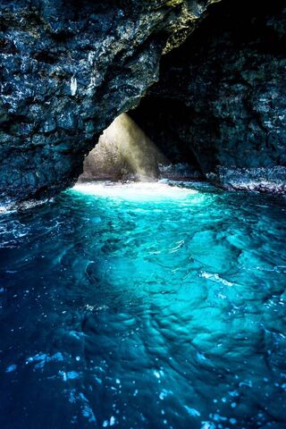 Mystical Light in the Ocean Cave 🌊✨