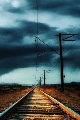 Journey Through the Stormy Tracks 🌩️🚂