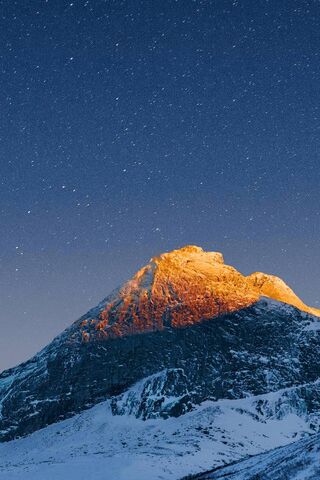 Majestic Peaks Under a Starry Sky 🌌🏔️