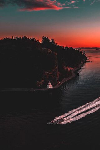 Serenity at Dusk: A Boat's Journey