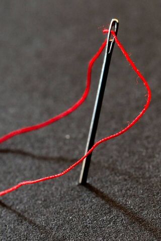 The Art of Stitching: A Thread's Journey