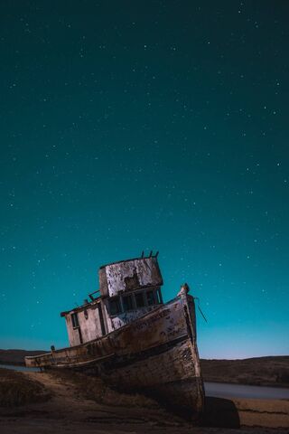 Abandoned Dreams: A Ship Under the Stars 🌌🚢