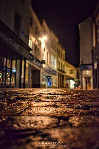 Glistening Streets: A Rainy Night's Charm 🌧️✨