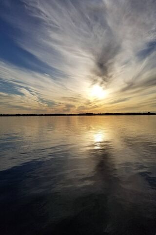 Serenity at St Andrews: A Sunset Reflection 🌅✨